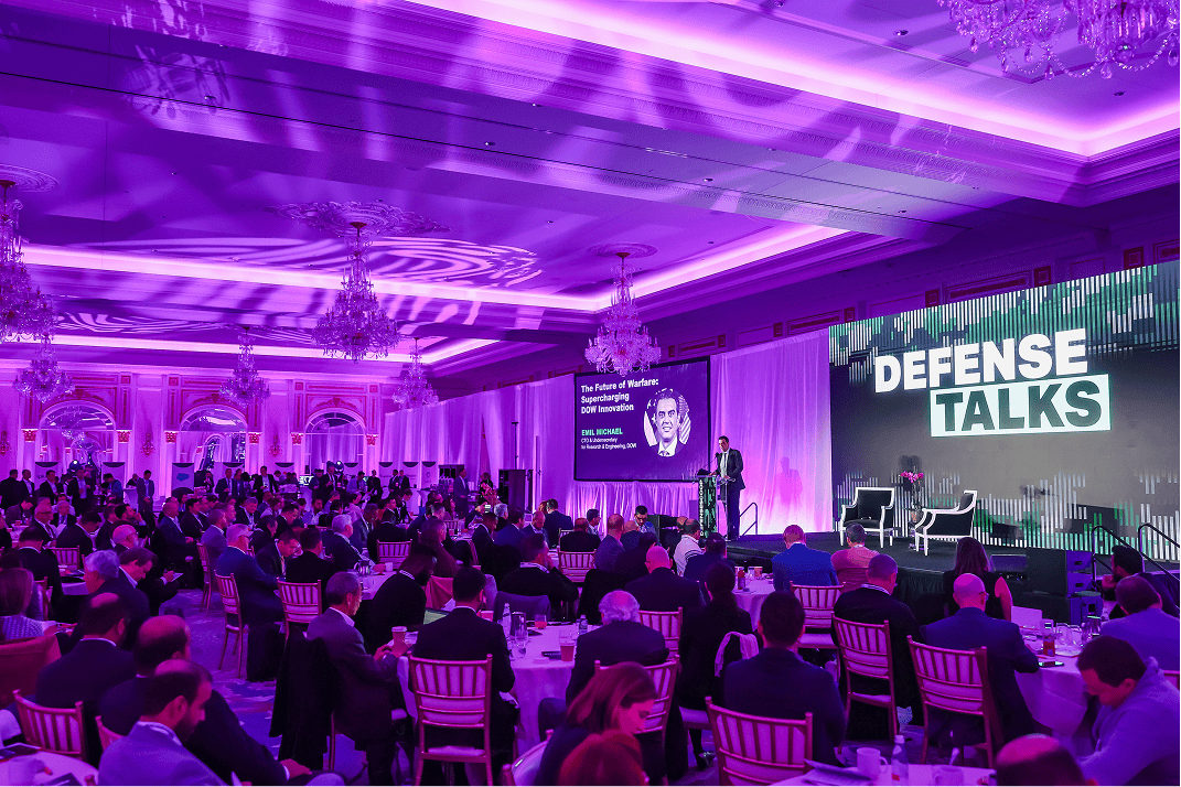 DefenseTalks conference audience and stage